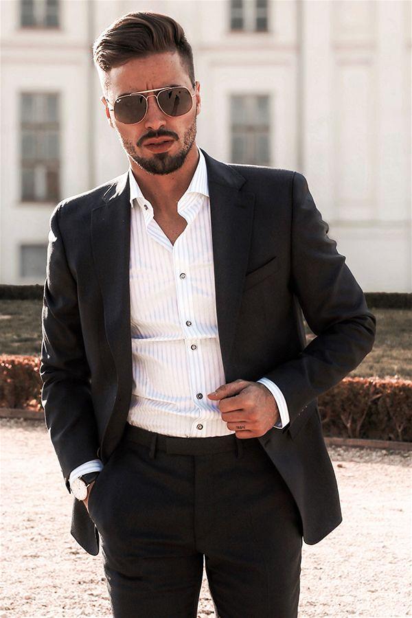 Imagem de um modelo masculino usando uma camisa social com colarinho aberto